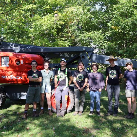 Group Picture in front of Skyjack Boom