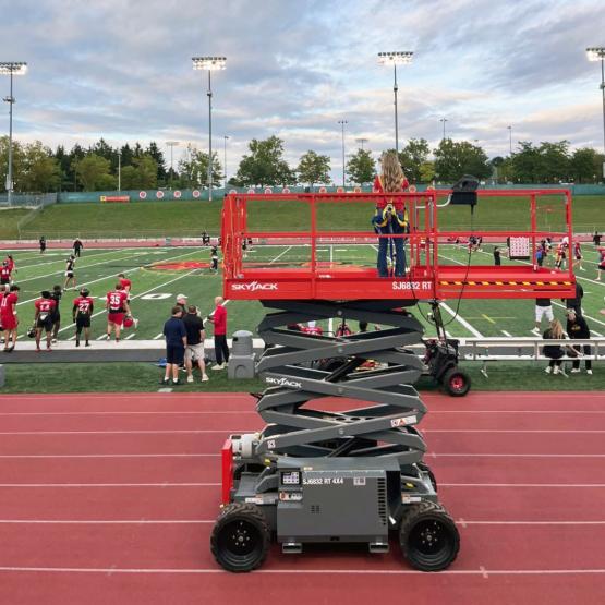 Skyjack rough terrain scissor lift at University of Guelph Alumni Stadium.