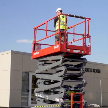 SJ4740 machine lifting a worker